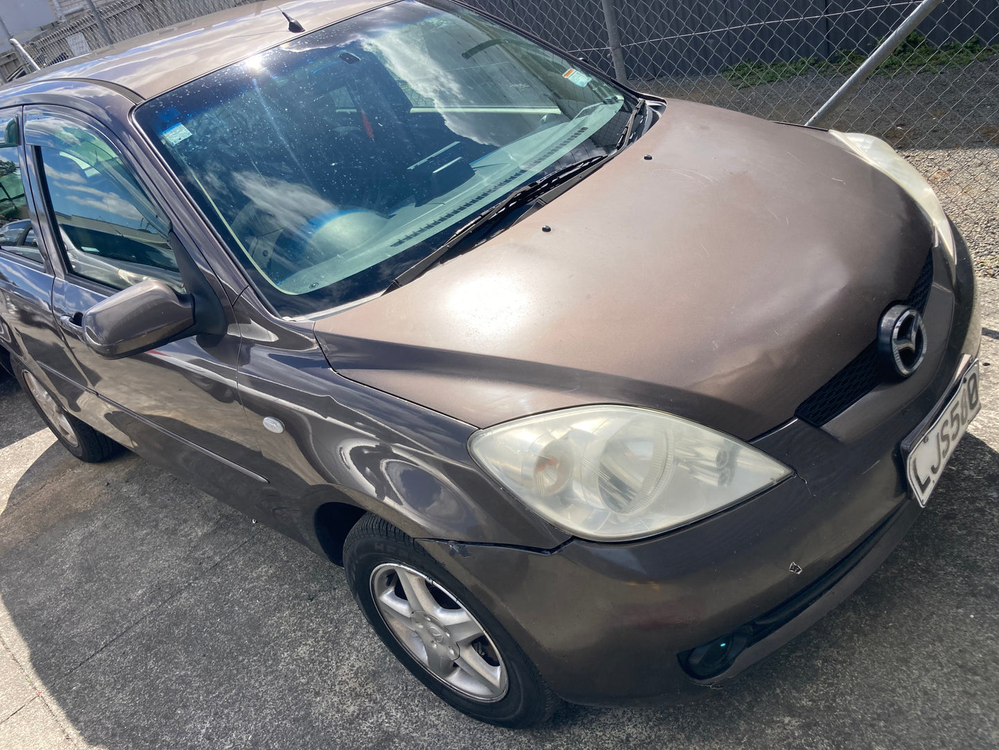 2005 MAZDA DEMIO / Brown / Hatchback
