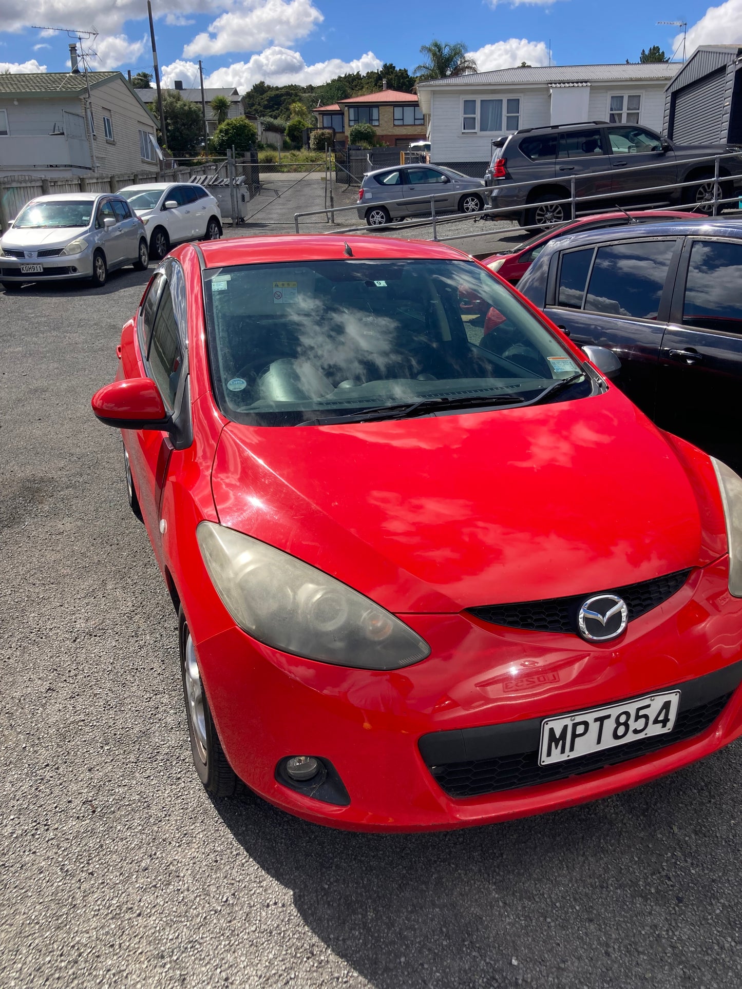 2010 MAZDA DEMIO / Red / Hatchback